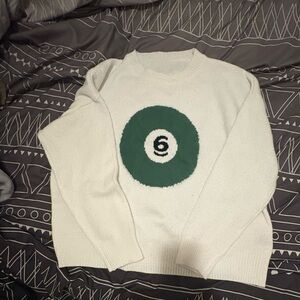 White Sweater with Green Circle Design